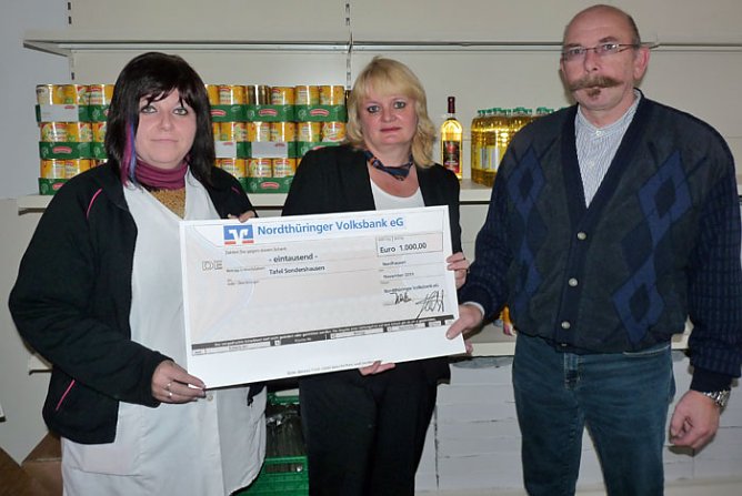 Scheck erhalten (Foto: Karl-Heinz Herrmann)