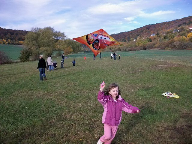 Der Herbst steht auf der Leiter