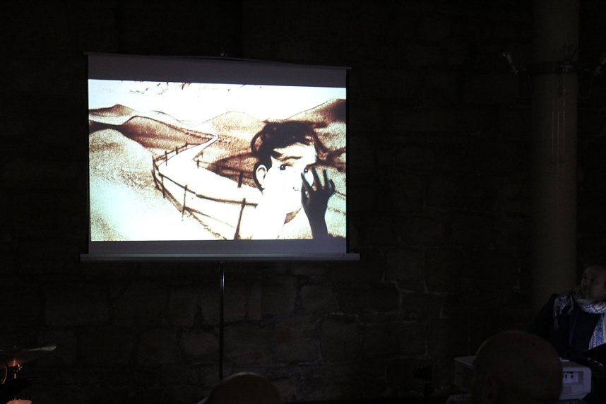 Simplicissimus in Sand gemalt